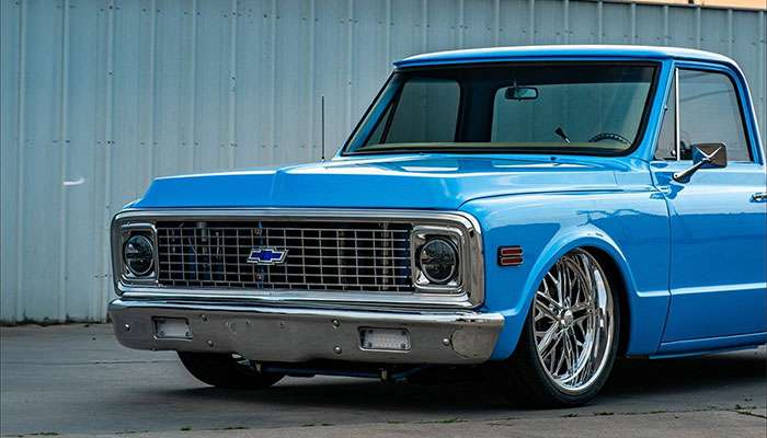 Foose custom five-spoke wheel on classic car